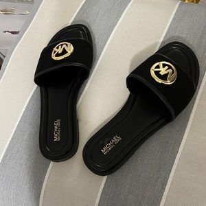 Beautiful MK sandals.. black color, very nice for use with pant, skirt or dress